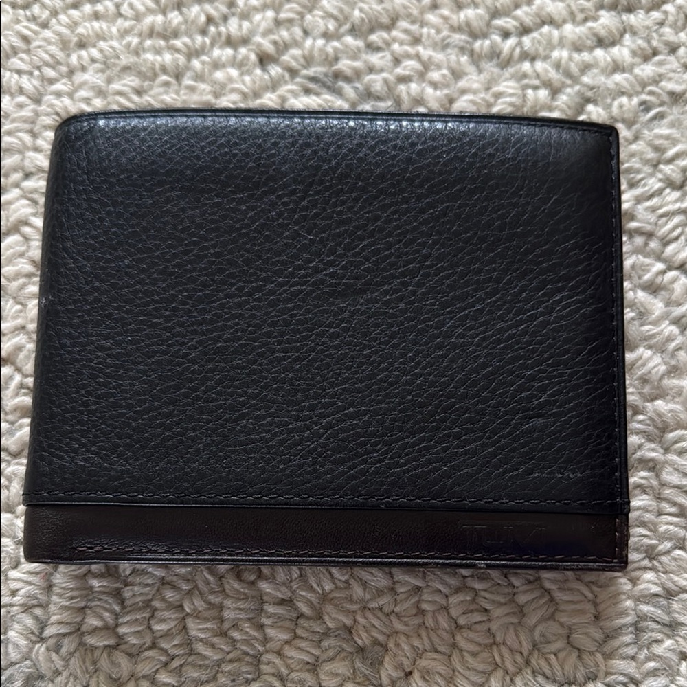 Tumi Black Leather Double Billfold Wallet with Coin Holder.